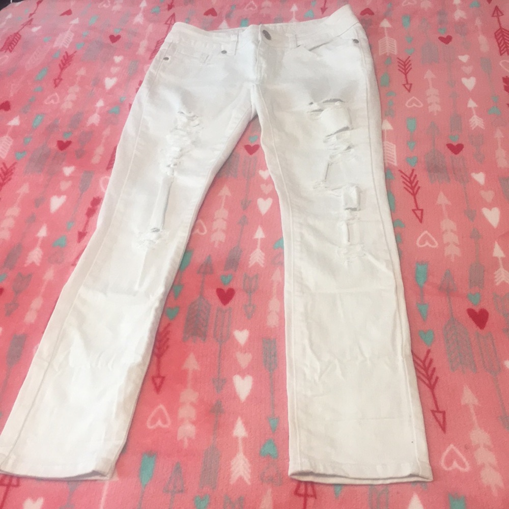 White ripped styled jeans